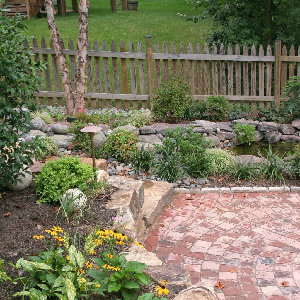 Finished garden landscaping with paved patio in Dunedin